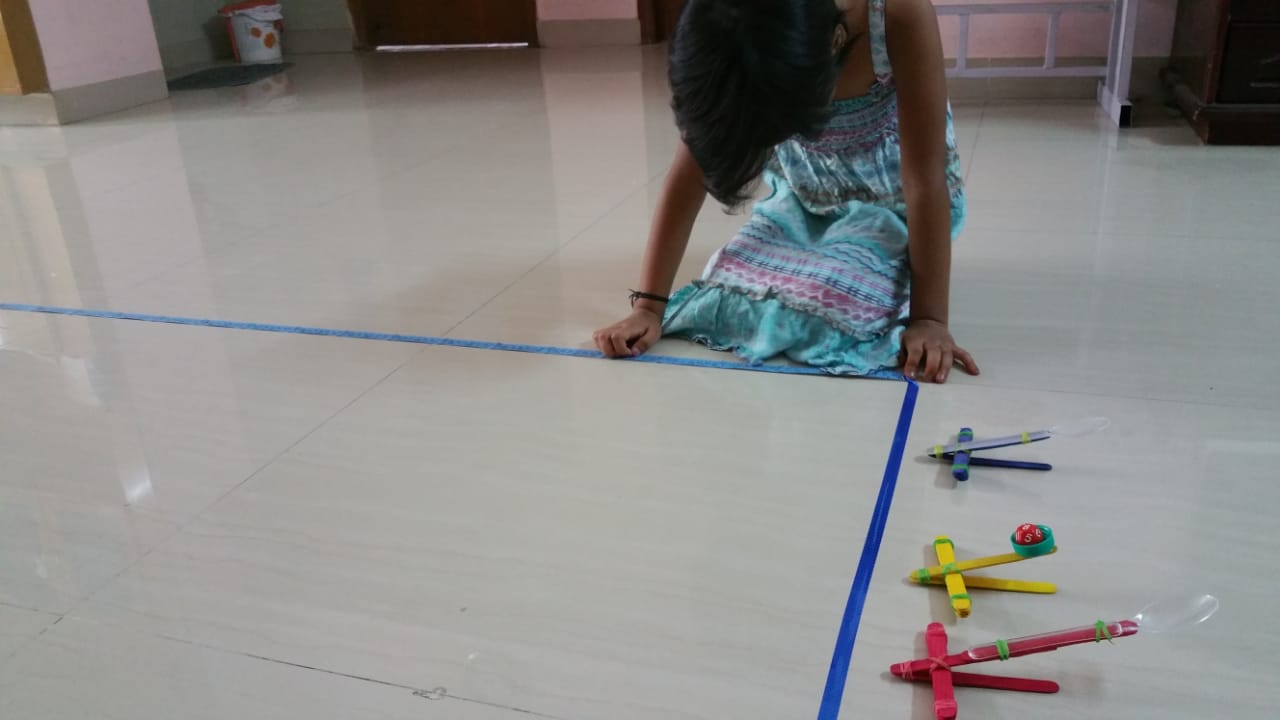 Measuring distance - Catapult STEM activity for kids, that combines science, engineering and maths with play
