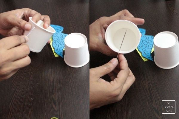 Insert needle to put hole in paper cups
